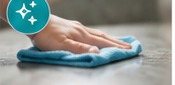 Hand wiping a clean surface